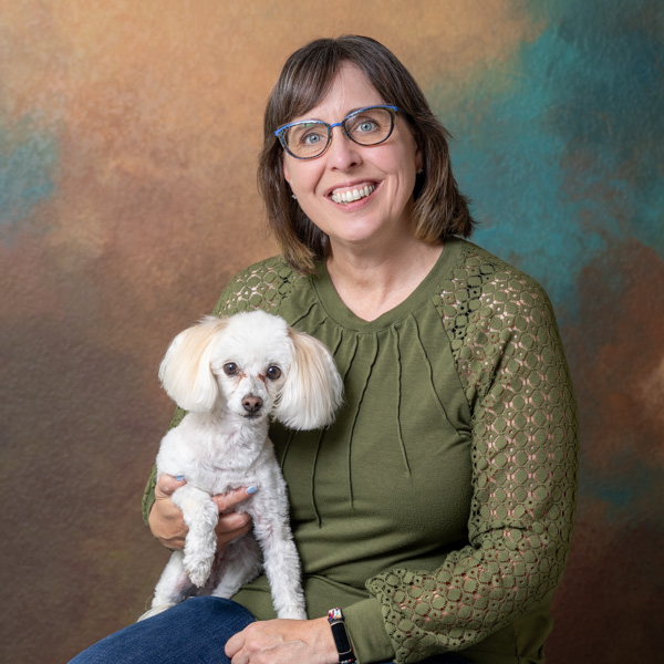 Monique and her dog, Bailey.